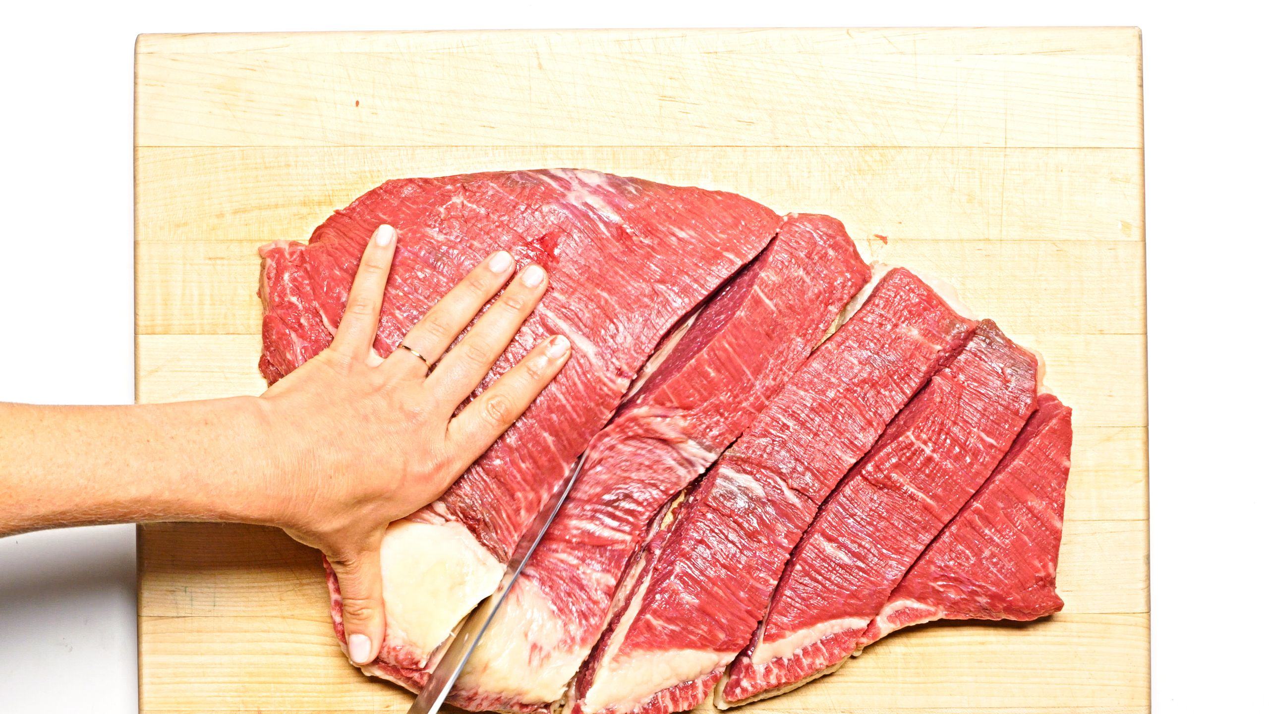 Mengapa Memotong Melawan Serat Daging Itu Penting?